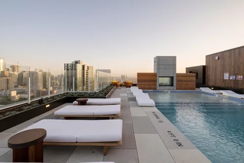 a balcony with furniture and a view