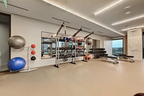 a view of a room with gym equipment