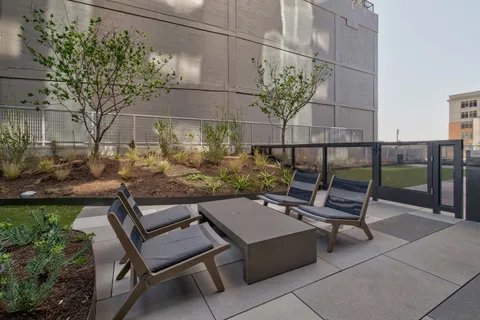 a view of a terrace with sitting area