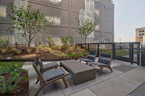 a view of a terrace with sitting area