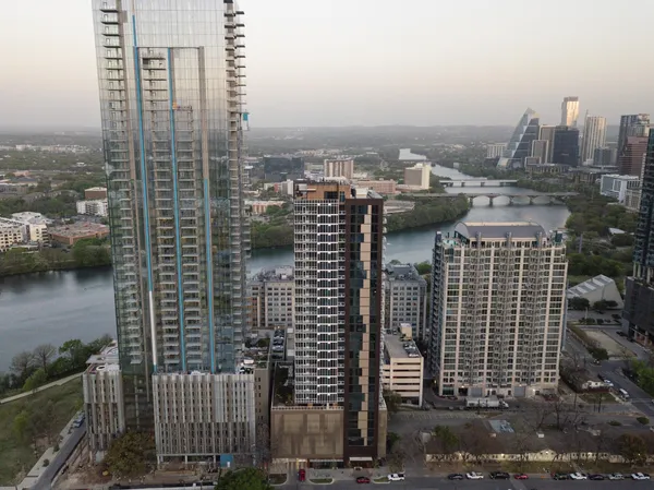 a view of a city with tall buildings