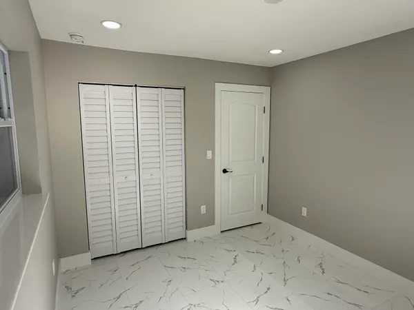 an empty room with closet
