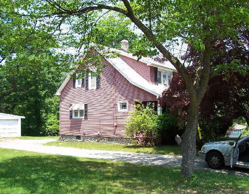 20 Botsford Road Seymour, CT 06483 - Photo 1 of 1 a view of a backyard with plants and large trees