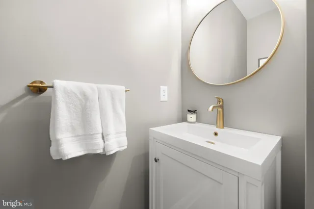 a bedroom with furniture and a flat screen tv