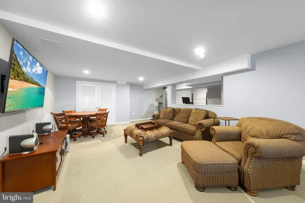 a room with furniture and gym equipment