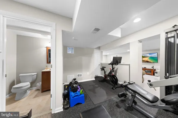 a view of a room with gym equipment