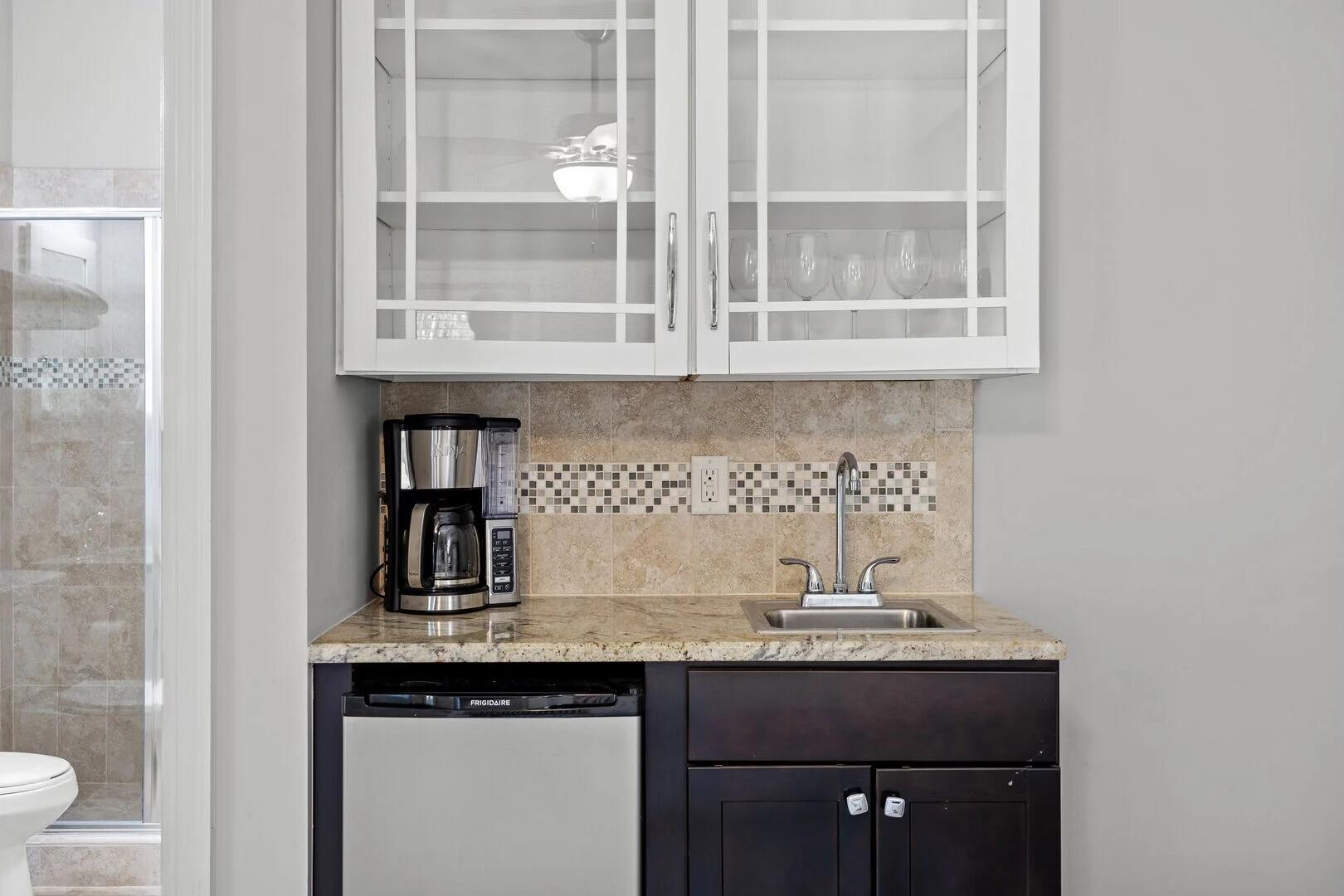 2059 Mack Bayou Road Santa Rosa Beach, FL 32459 - Photo 24 of 51 a kitchen with a sink and cabinets