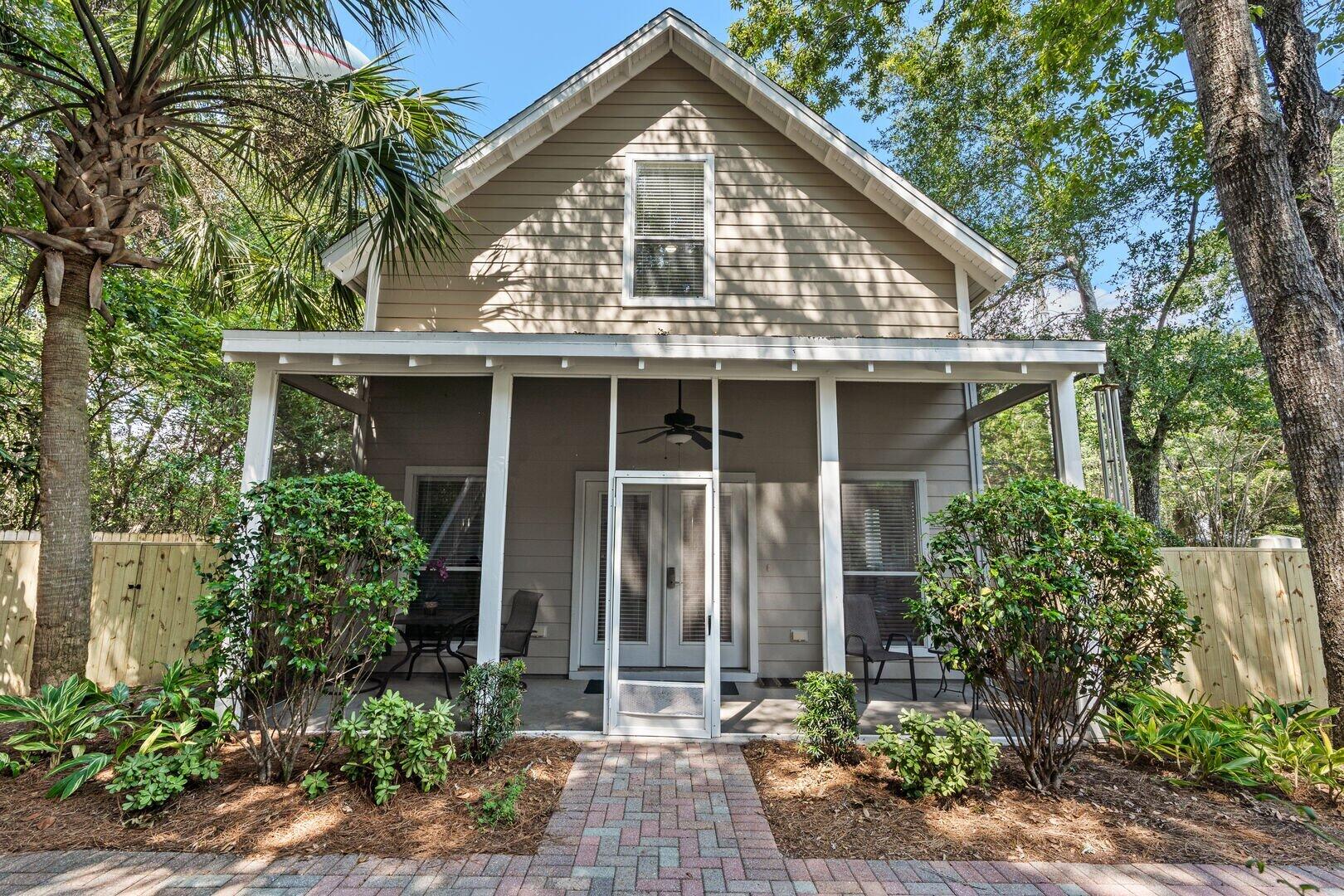 2059 Mack Bayou Road Santa Rosa Beach, FL 32459 - Photo 27 of 51 a front view of a house with a yard