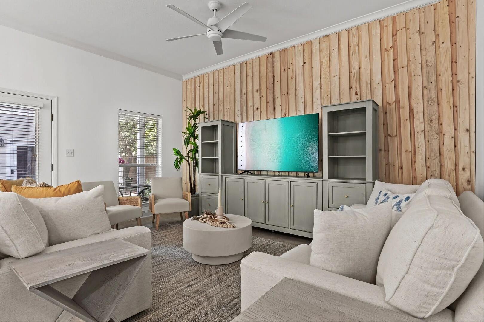 2059 Mack Bayou Road Santa Rosa Beach, FL 32459 - Photo 30 of 51 a living room with furniture and a flat screen tv
