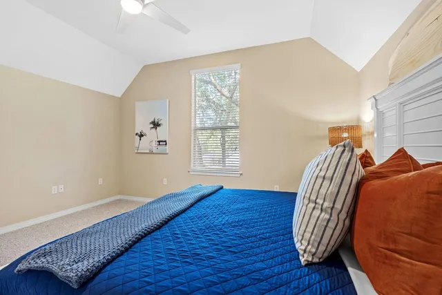 a dining room with furniture a rug and wooden floor