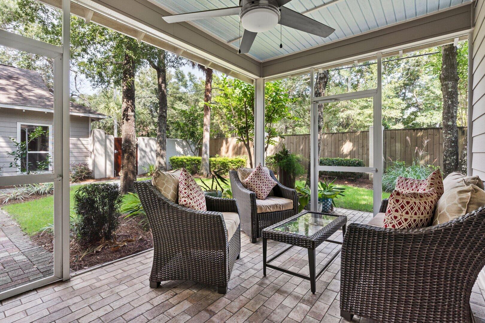 2059 Mack Bayou Road Santa Rosa Beach, FL 32459 - Photo 5 of 51 a view of a porch with furniture and garden