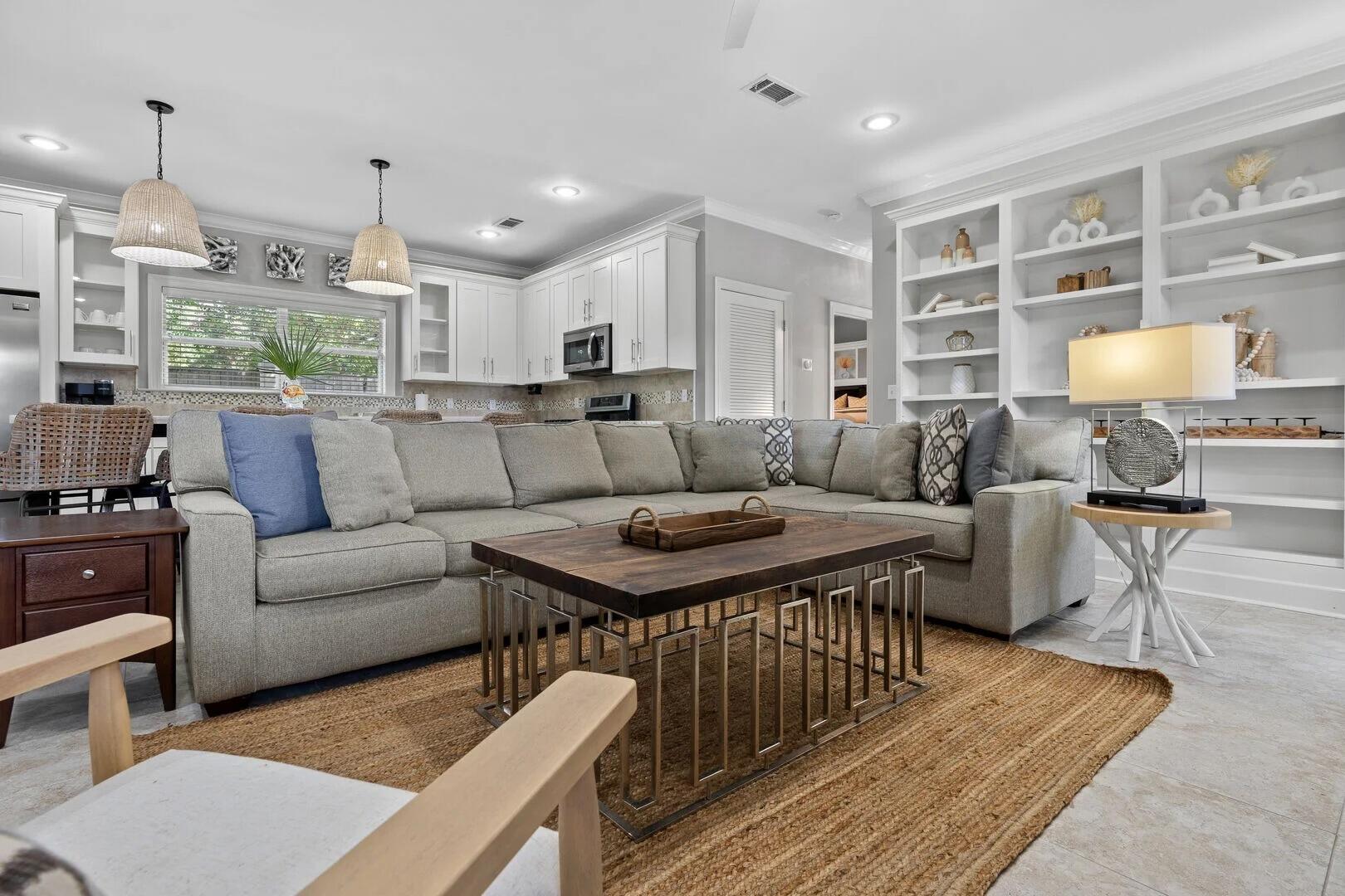 2059 Mack Bayou Road Santa Rosa Beach, FL 32459 - Photo 8 of 51 a living room with furniture a rug and a chandelier
