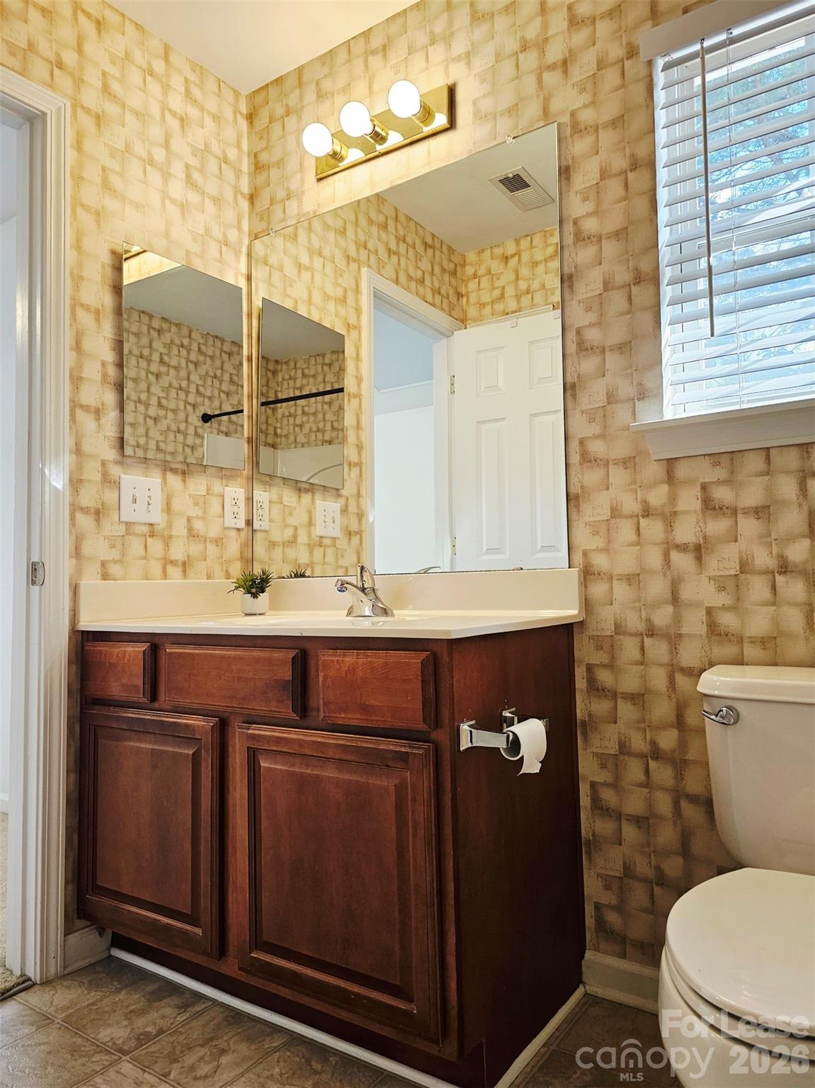 10609 Fuller Ridge Circle Charlotte, NC 28270 - Photo 24 of 29 a bathroom with a sink a toilet and shower