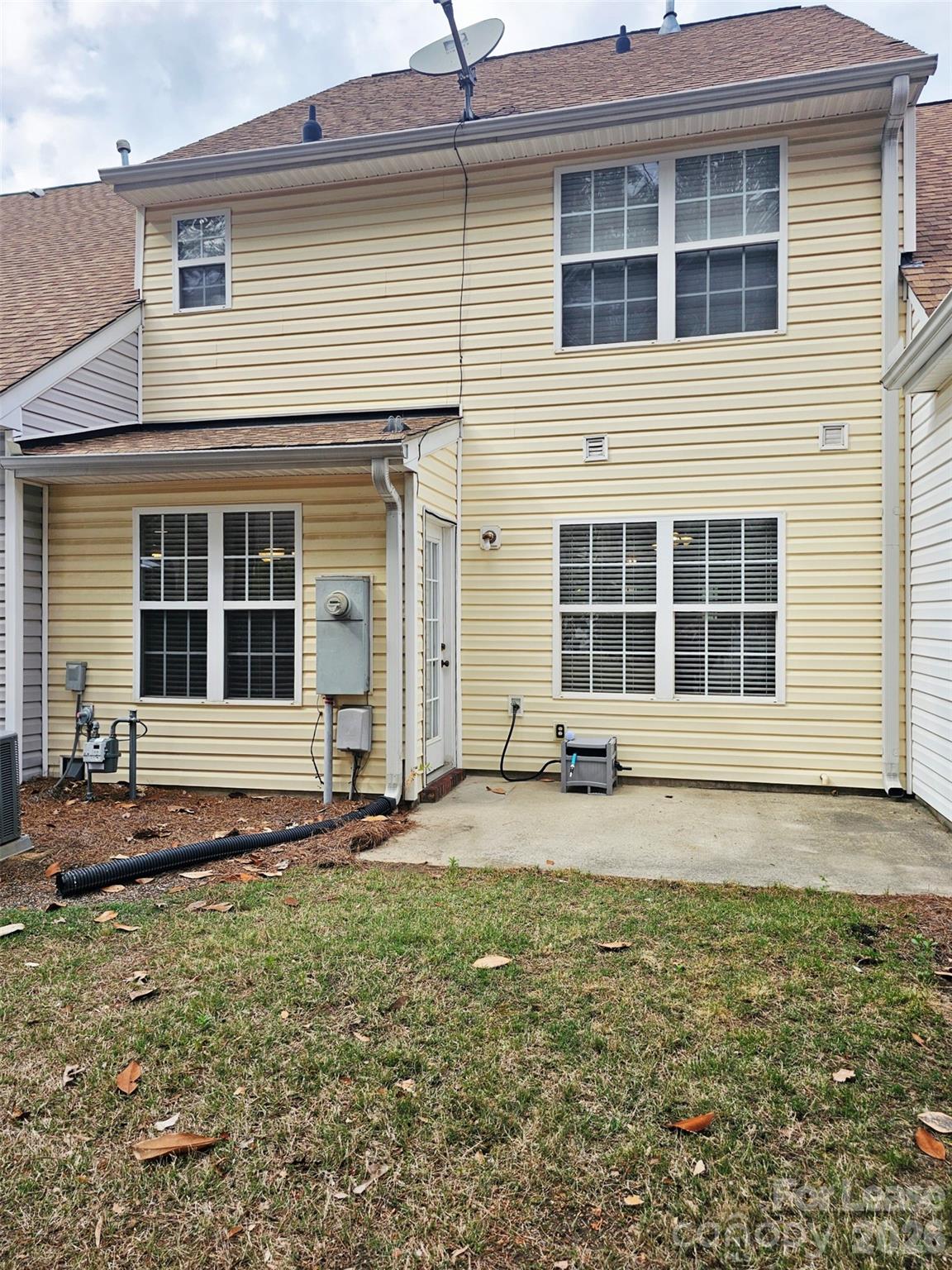 10609 Fuller Ridge Circle Charlotte, NC 28270 - Photo 26 of 29 a front view of a house with a yard