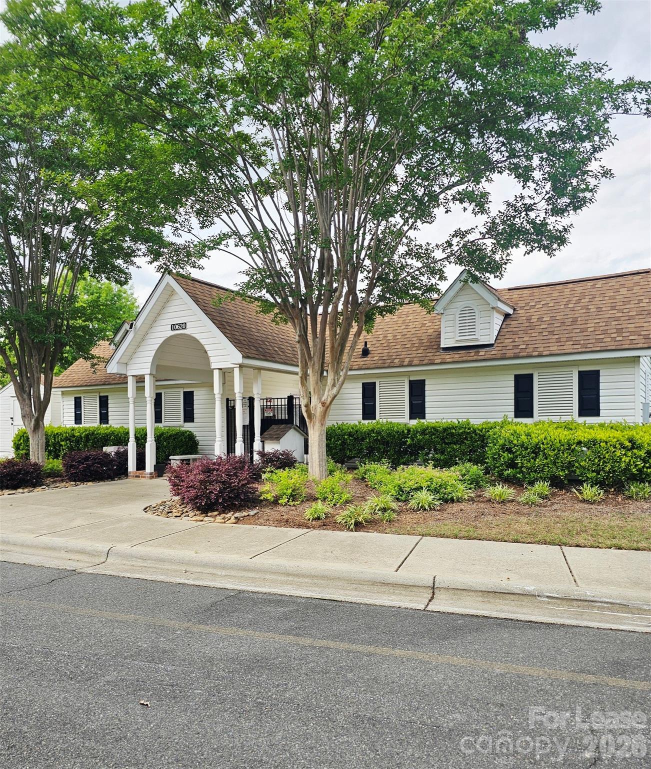 10609 Fuller Ridge Circle Charlotte, NC 28270 - Photo 28 of 29 a front view of a house with a yard