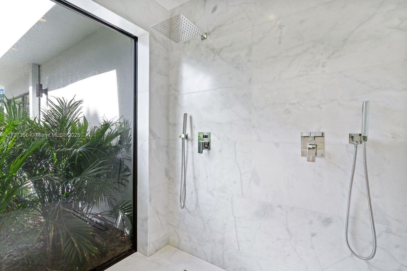 10 Pinta Road Miami, FL 33133 - Photo 20 of 28 a bathroom with a shower