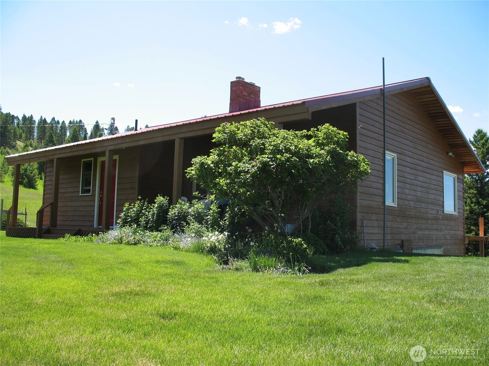 40 Turner Homestead Road Oroville, WA 98844 - Photo 3 of 27 a front view of a house with a yard