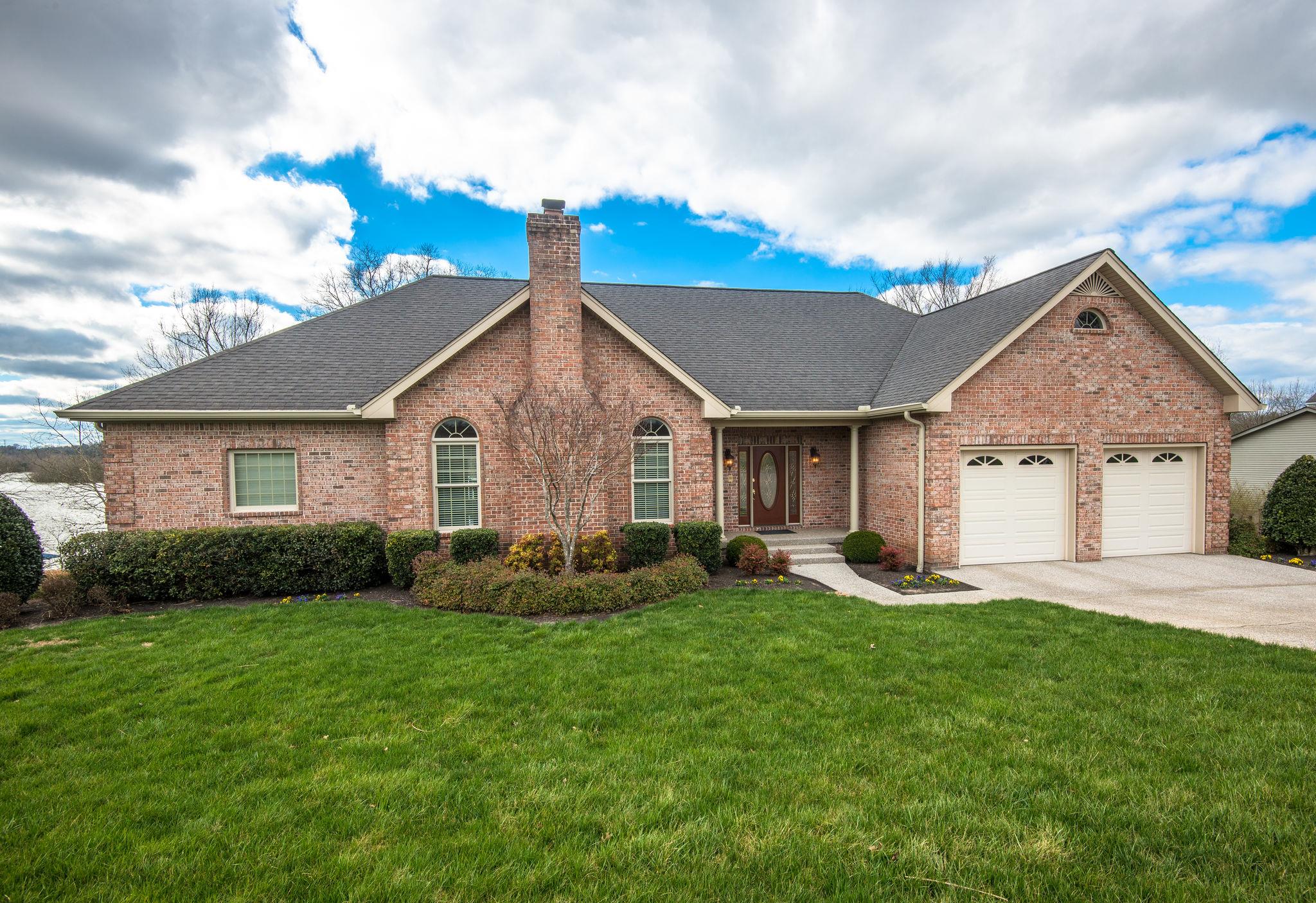 280 North Denny Road Lebanon, TN 37087 - Photo 2 of 30 a front view of a house with a yard and garage