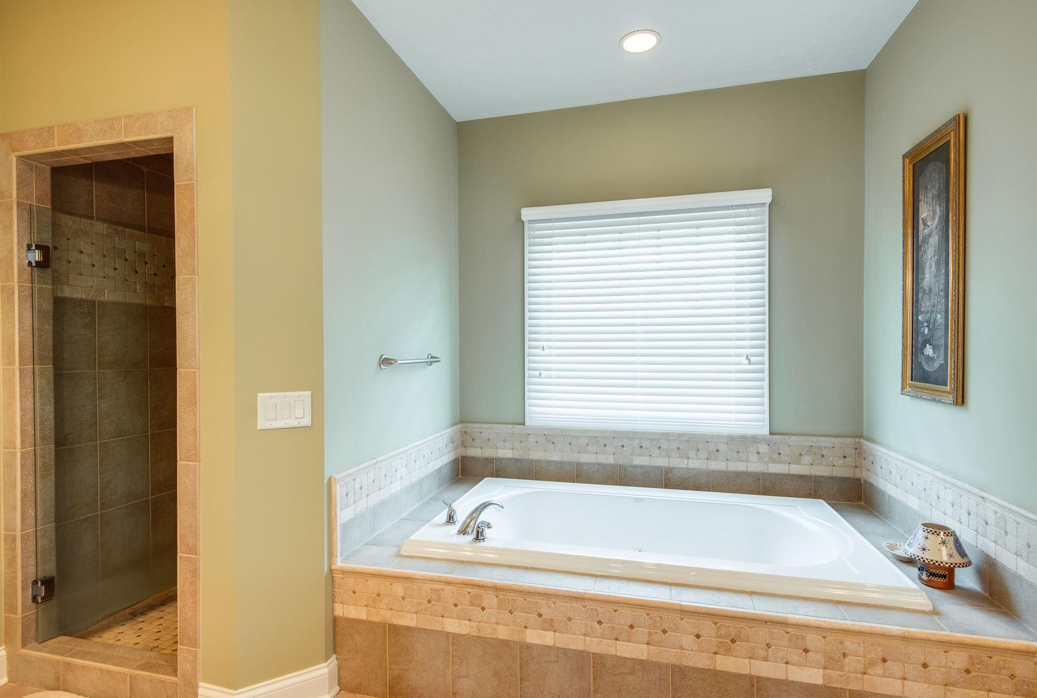 280 North Denny Road Lebanon, TN 37087 - Photo 13 of 30 a bath tub sitting in a bathroom next to a window