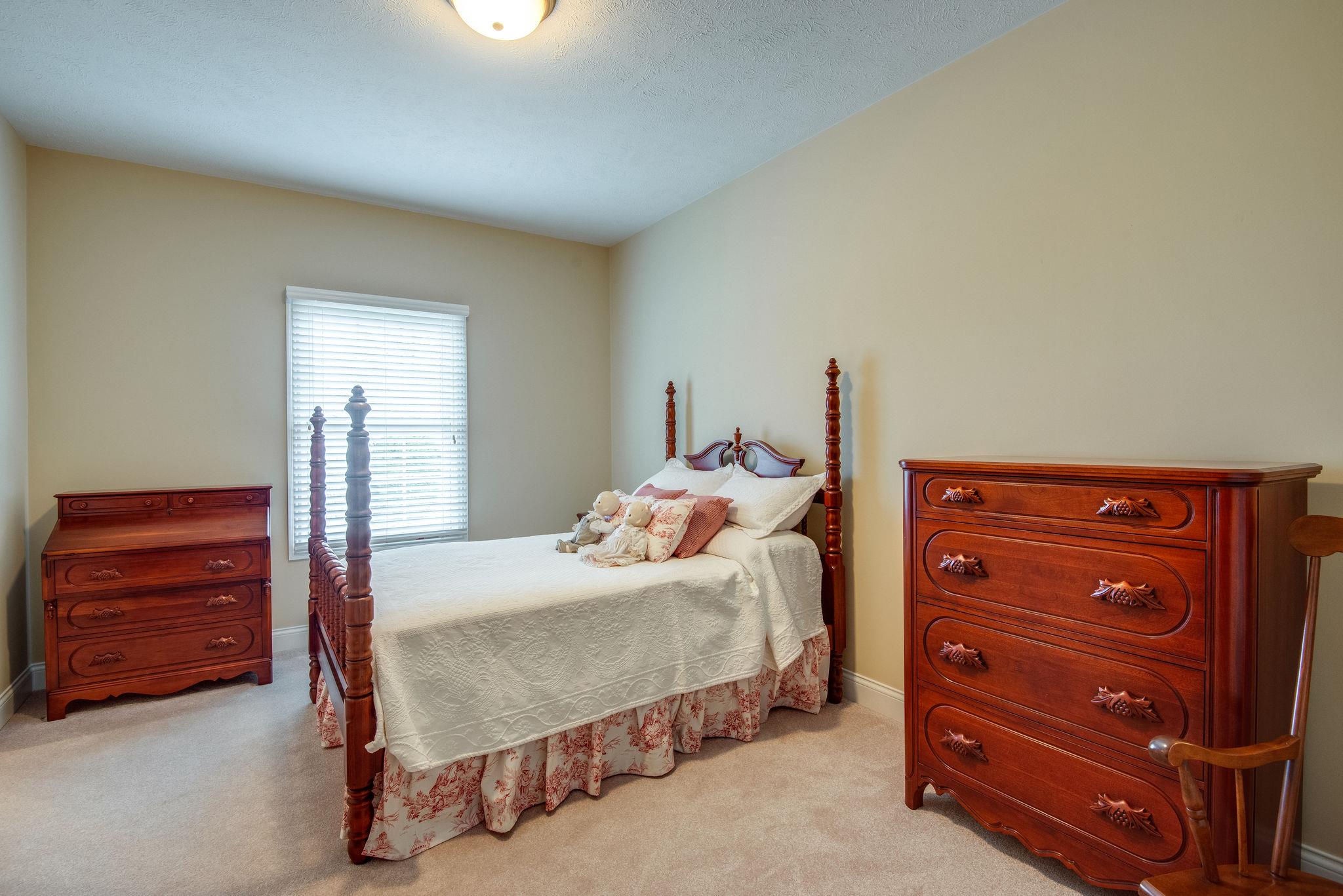 280 North Denny Road Lebanon, TN 37087 - Photo 18 of 30 a bedroom with a bed and a dresser