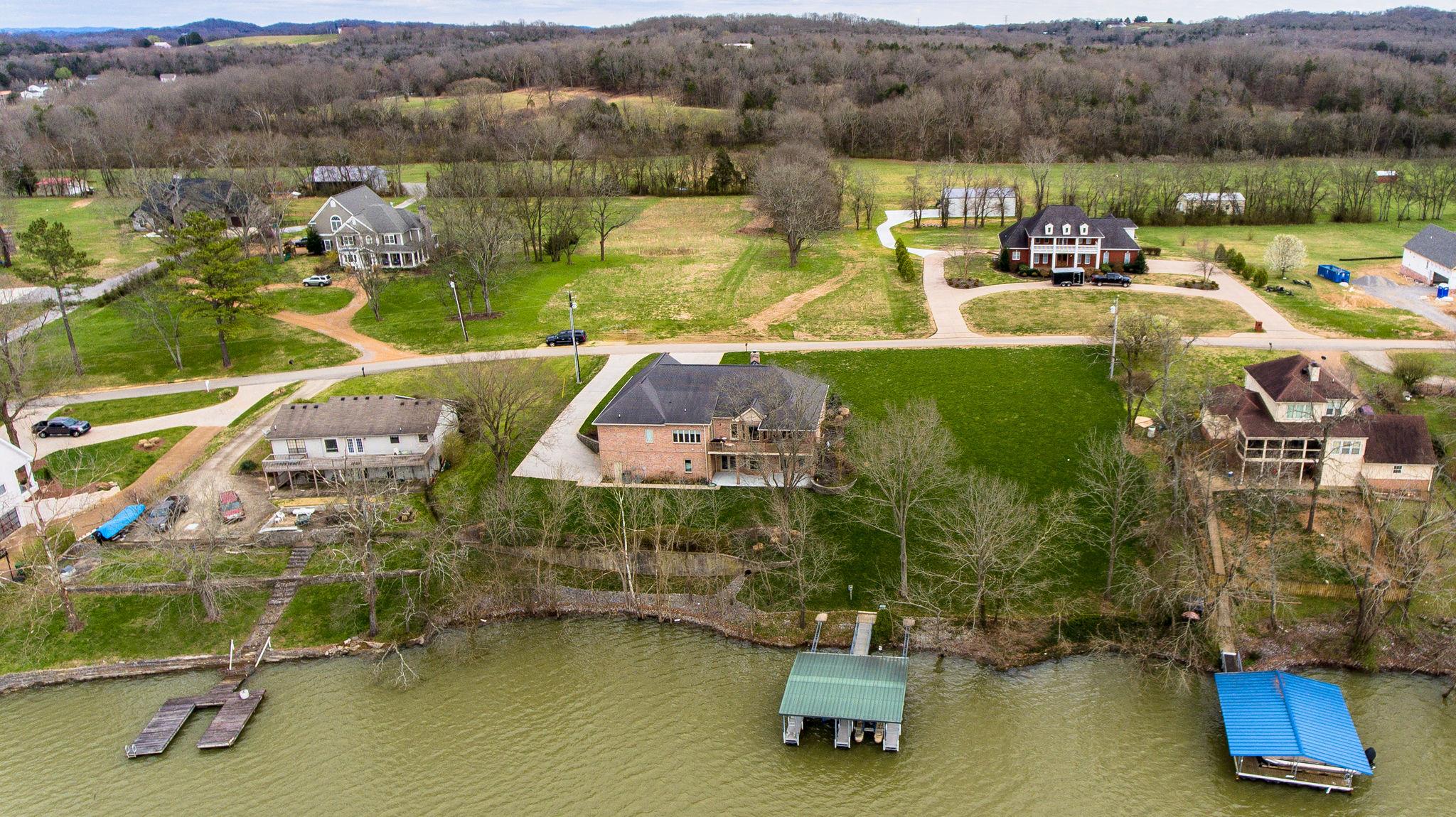 280 North Denny Road Lebanon, TN 37087 - Photo 29 of 30 an aerial view of a house with swimming pool and lake view