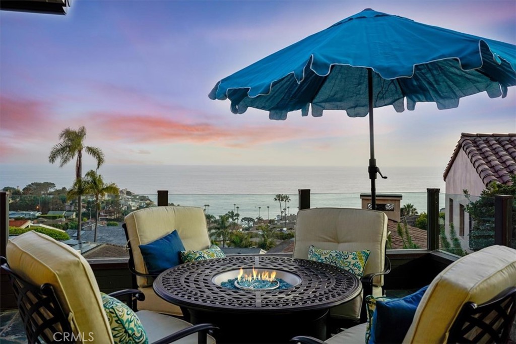 437 Emerald Bay Laguna Beach, CA 92651 - Photo 14 of 34 Front Patio Seating and Fire Table
