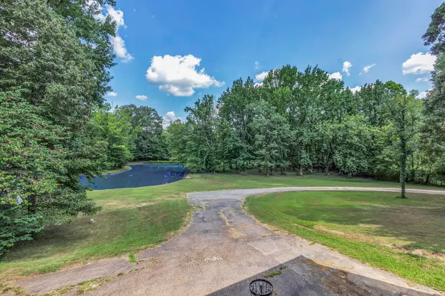 a view of a golf course with a garden
