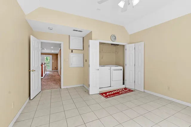 a view of a livingroom with wooden floor