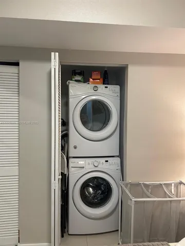 a terrace with outdoor seating and city view