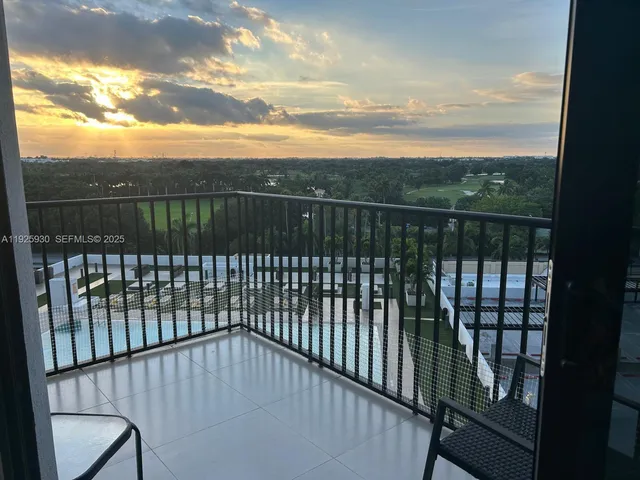 a view of a chairs and table on the terrace