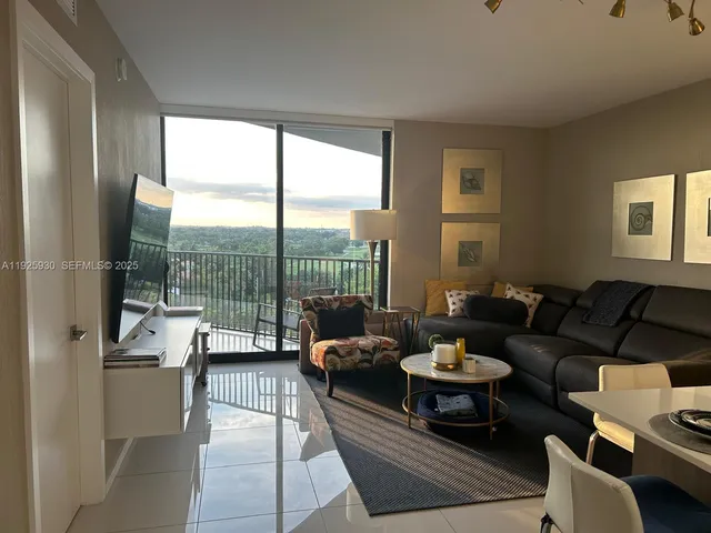 a kitchen with a table and chairs in it