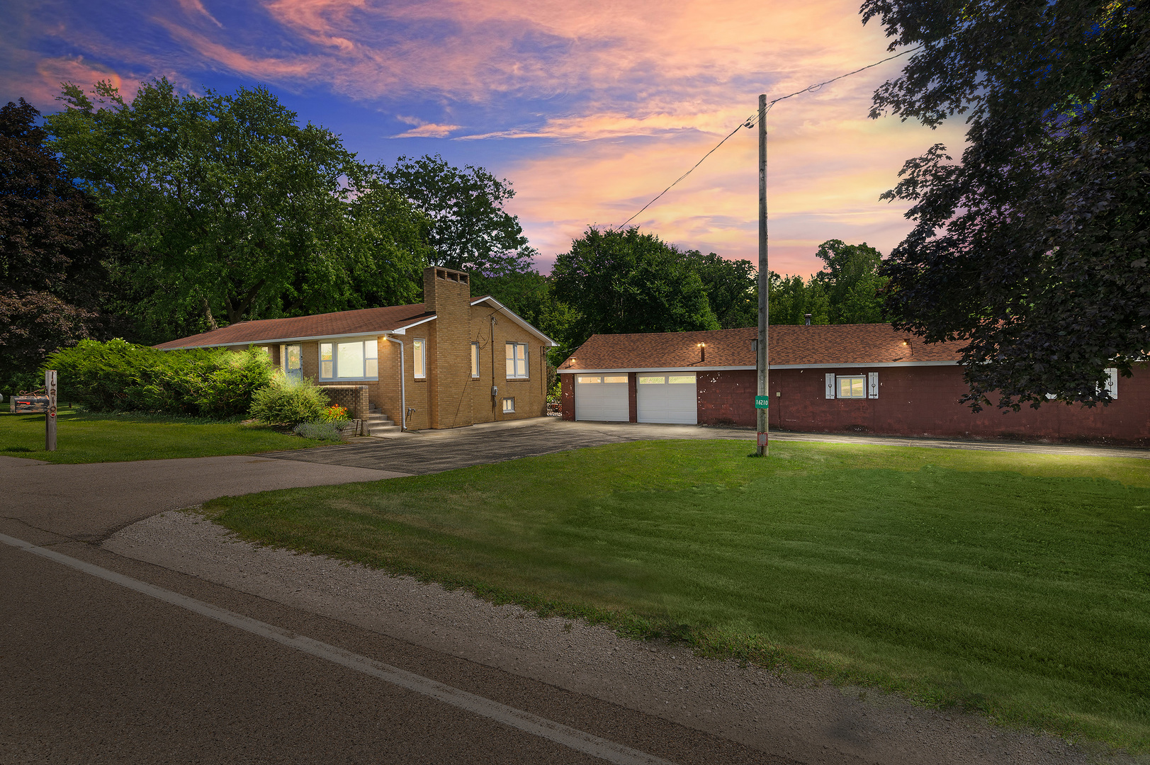 16210 Barber Greene Road Maple Park, IL 60151 - Photo 1 of 52 a front view of a house with a yard