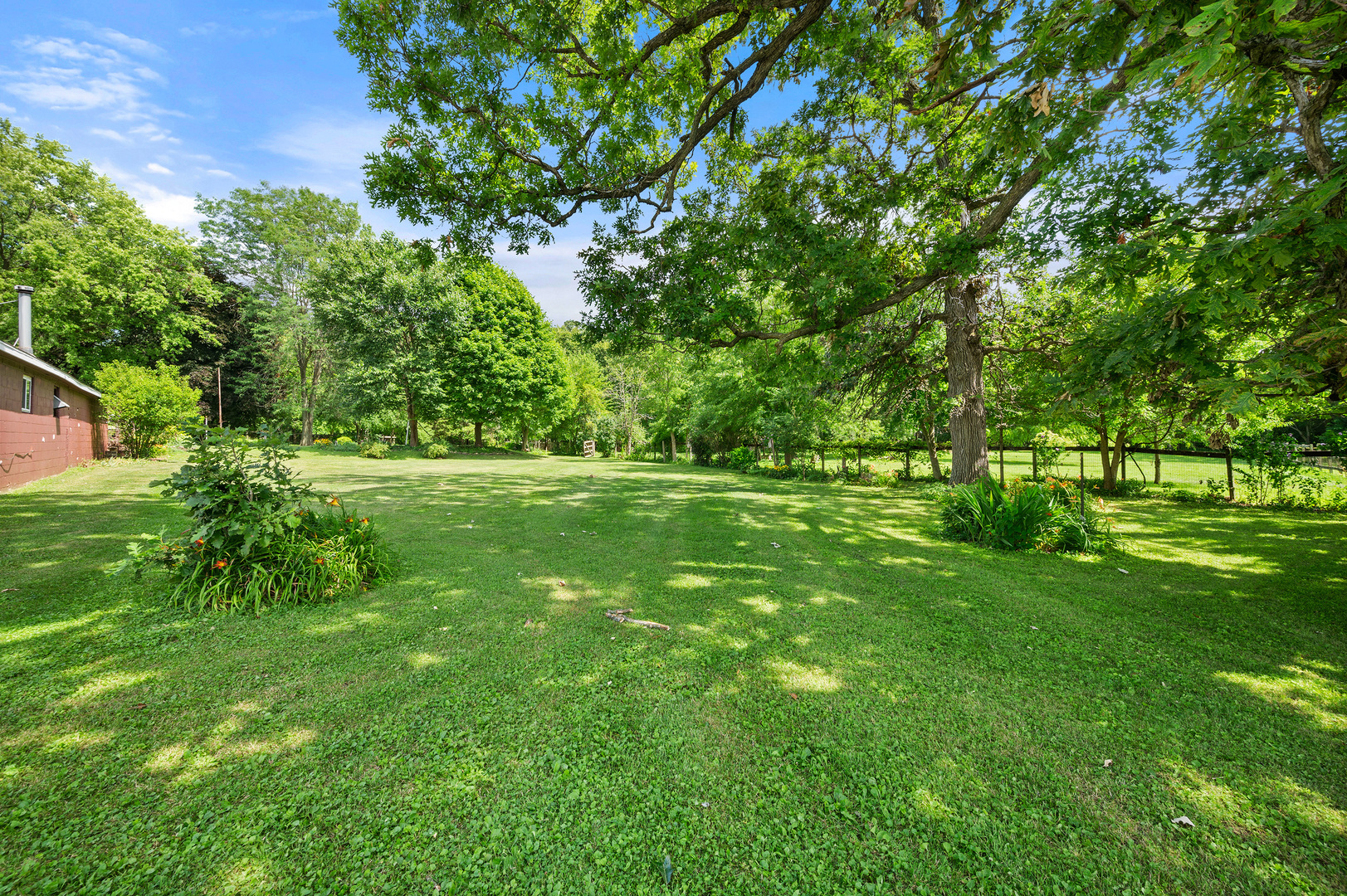 16210 Barber Greene Road Maple Park, IL 60151 - Photo 20 of 52 a view of grassy field with benches