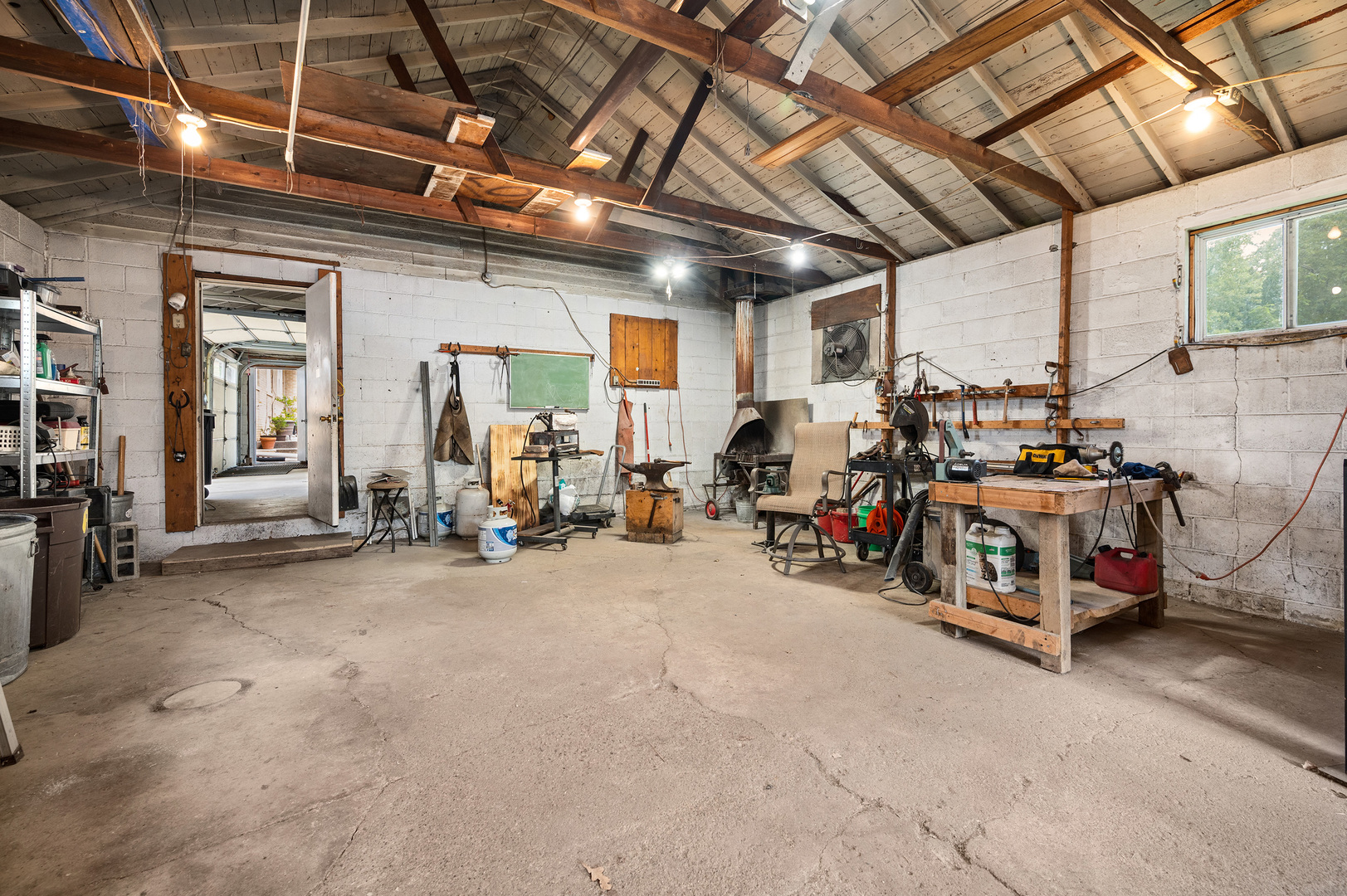 16210 Barber Greene Road Maple Park, IL 60151 - Photo 25 of 52 a view of a room with gym equipment