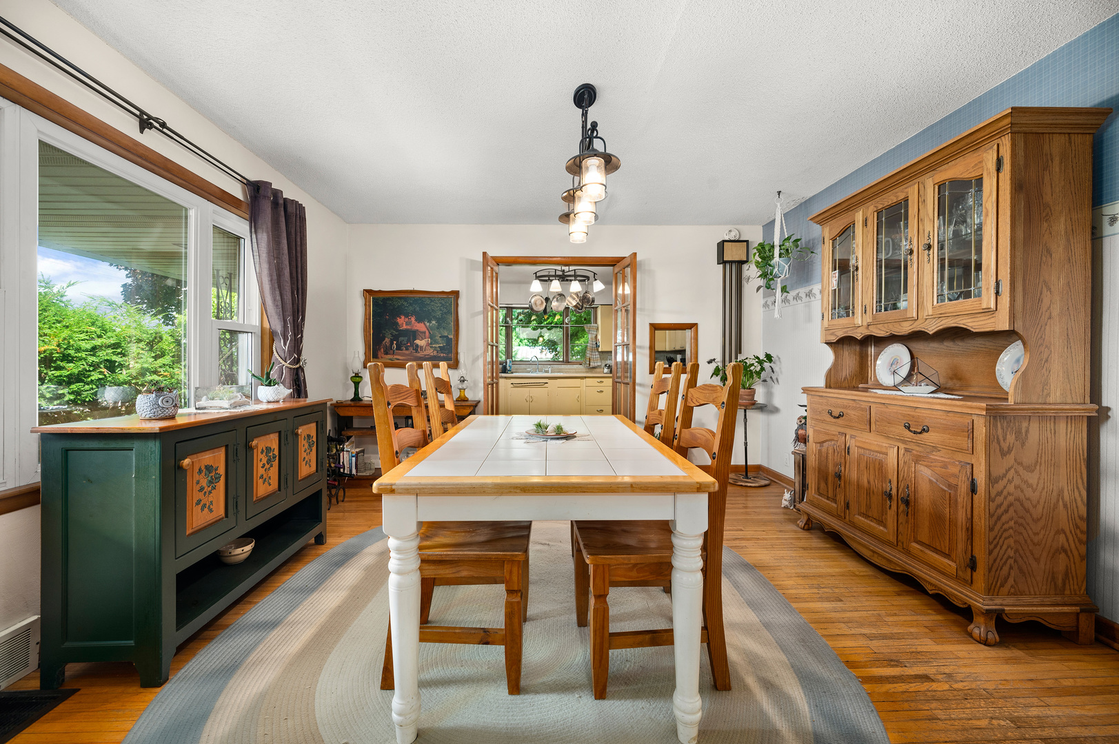 16210 Barber Greene Road Maple Park, IL 60151 - Photo 38 of 52 a view of a dining room with furniture window and wooden floor