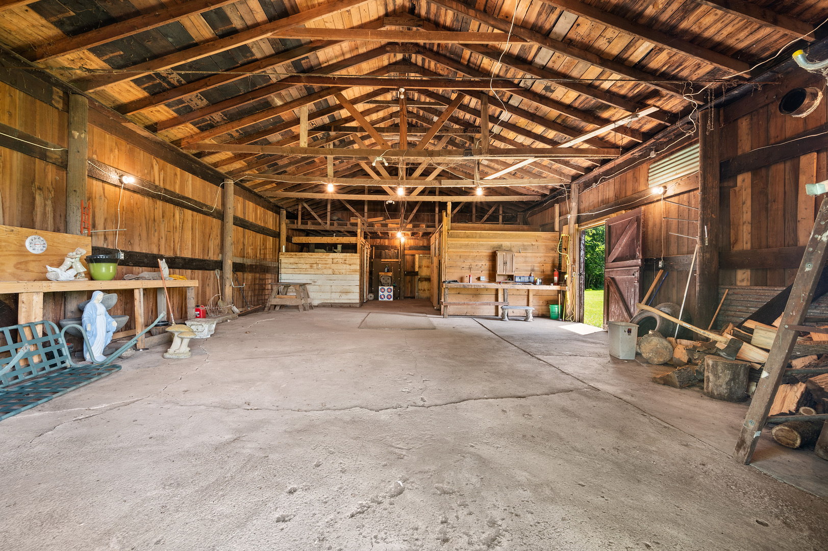 16210 Barber Greene Road Maple Park, IL 60151 - Photo 10 of 52 a view of a garage with wooden floor