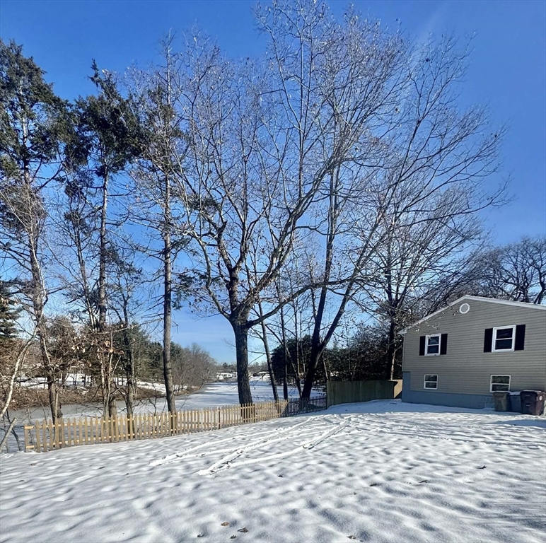 382 Holyoke Street Ludlow, MA 01056 - Photo 2 of 17 a view of a house with a snow in the yard