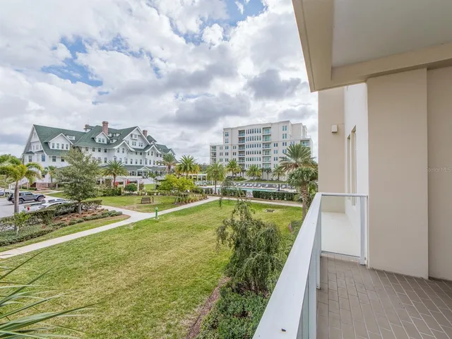 a view of swimming pool from a balcony