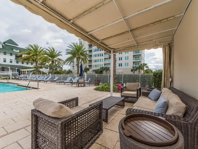 a outdoor living space with furniture and city view