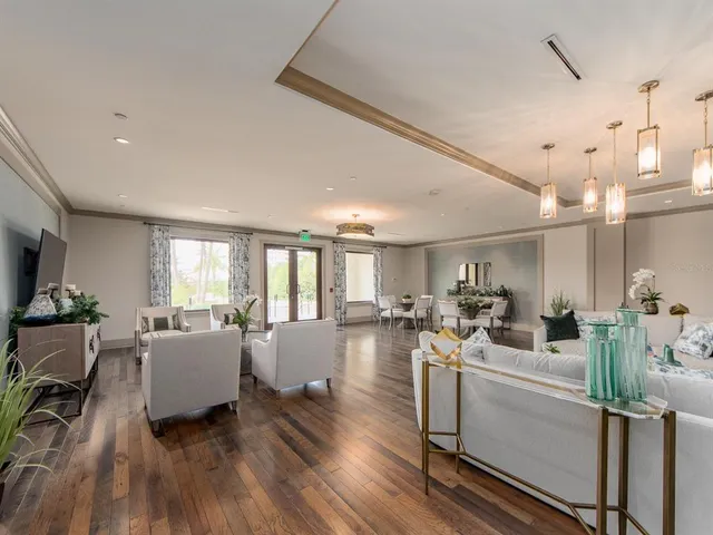 a very nice looking living room with a large window