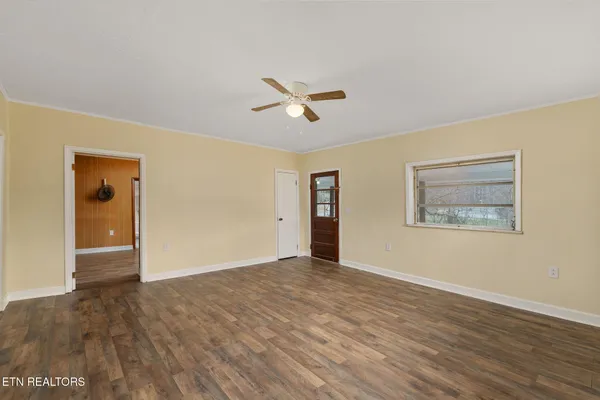 a view of an empty room with a window