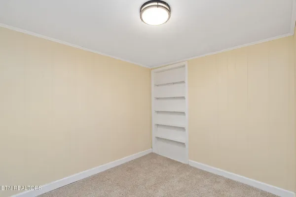 a view of a room with racks on the wall