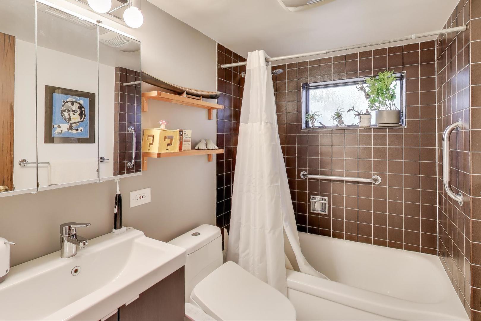 321 Ferndale Road Glenview, IL 60025 - Photo 17 of 30 a bathroom with a sink toilet and shower