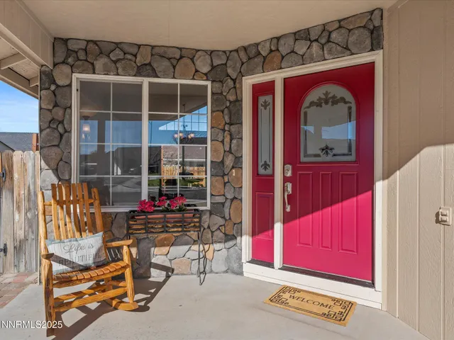a kitchen with stainless steel appliances a stove sink microwave and cabinets
