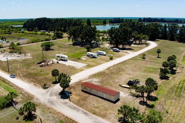 a view of swimming pool with outdoor seating