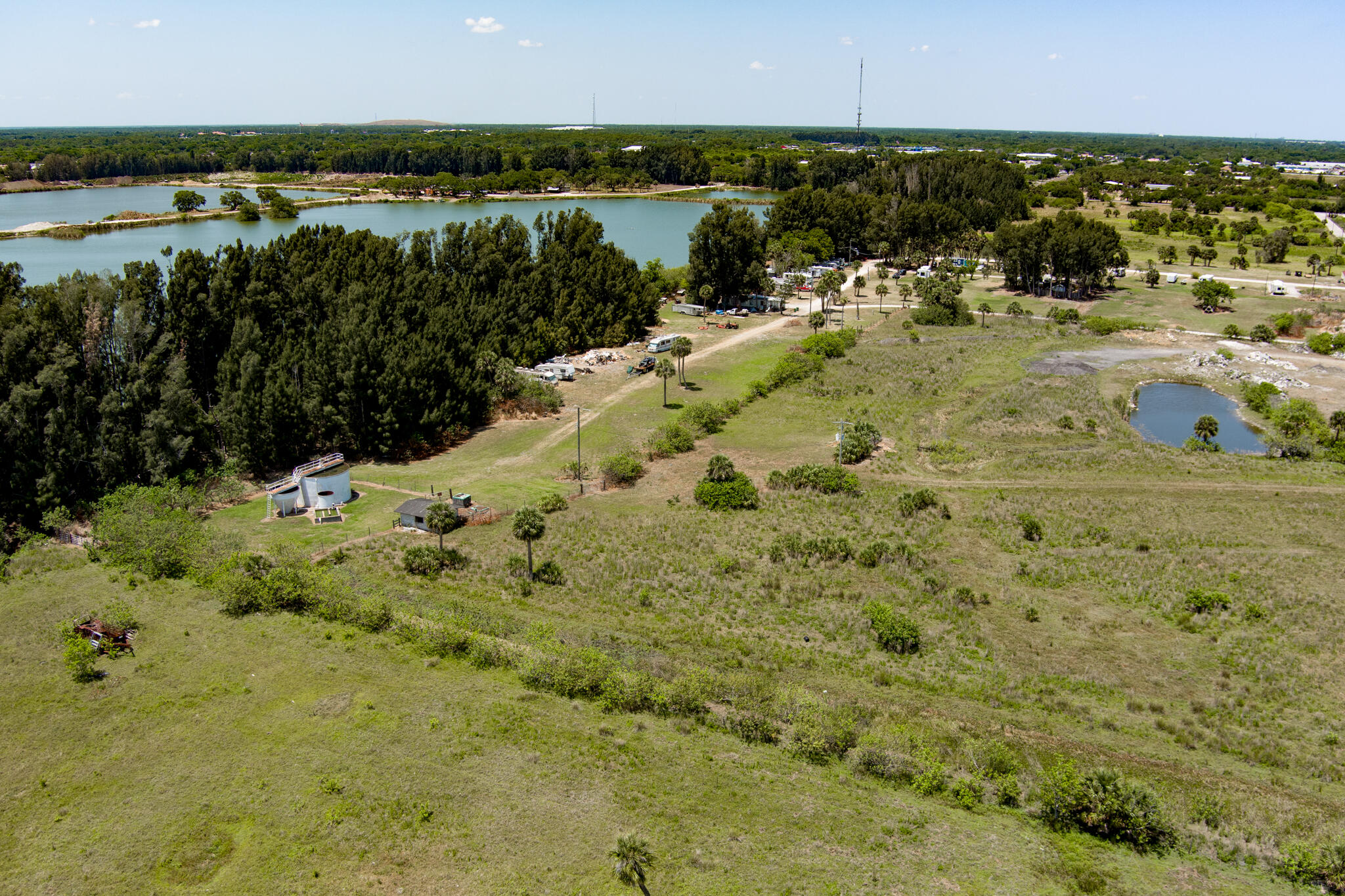 0 Pluckebaum Road Cocoa, FL 32926 - Photo 12 of 15 a view of a lake with a beach