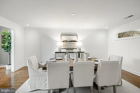 a kitchen with stainless steel appliances a stove sink and cabinets