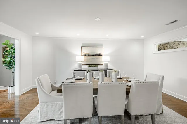 a kitchen with stainless steel appliances a stove sink and cabinets