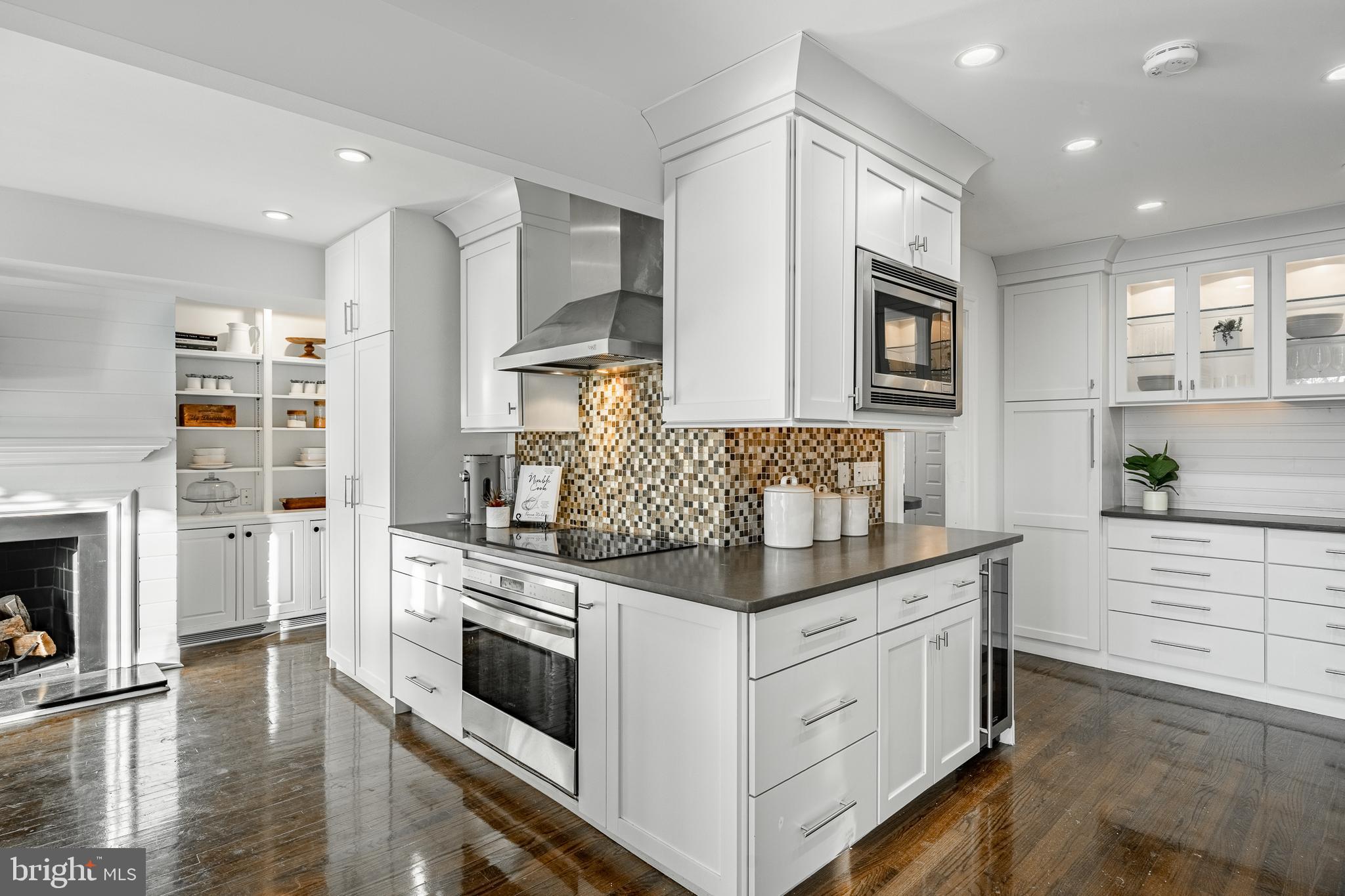 1256 Round Hill Road Bryn Mawr, PA 19010 - Photo 21 of 65 a kitchen with stainless steel appliances granite countertop a stove and a sink