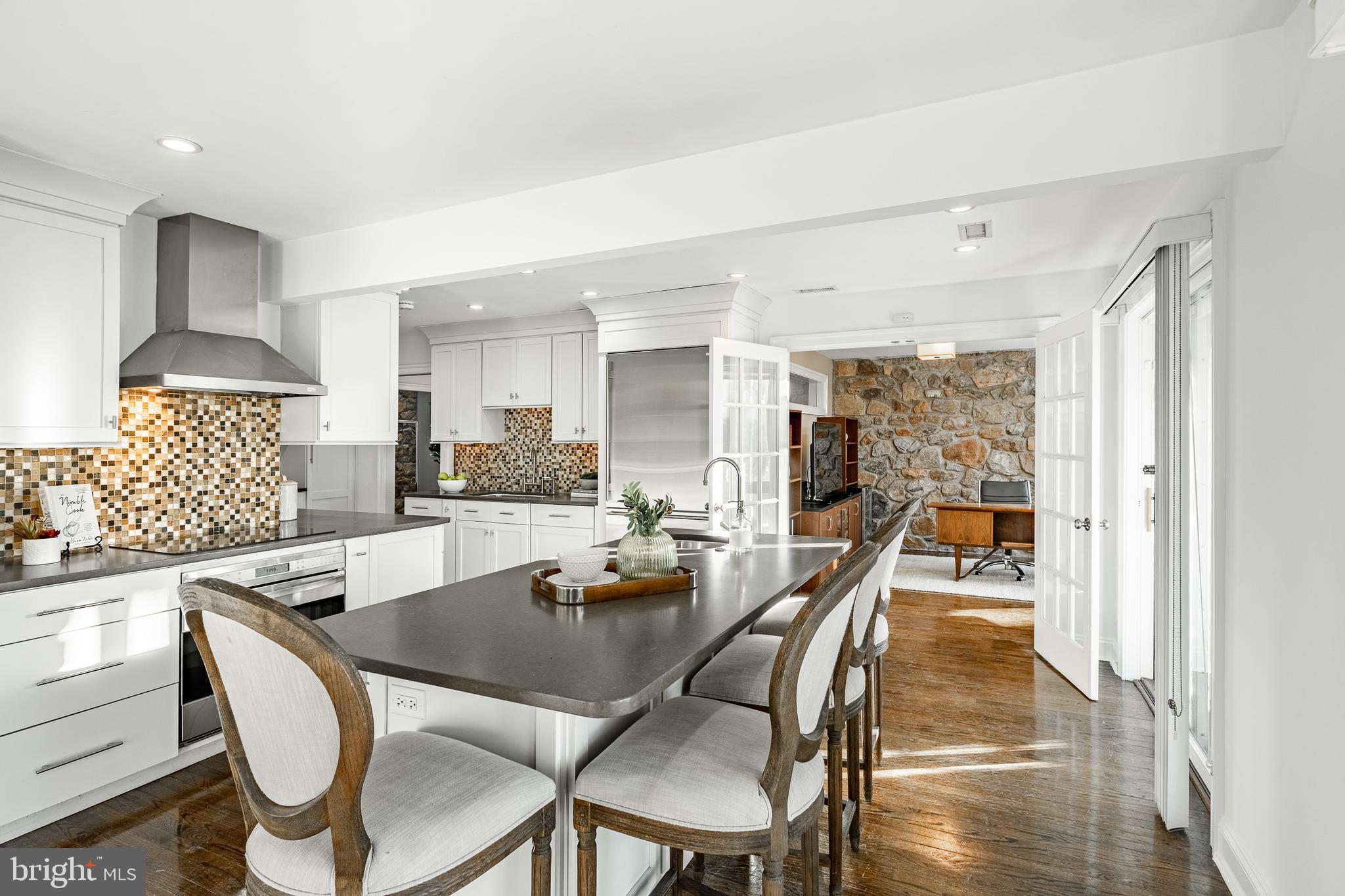 1256 Round Hill Road Bryn Mawr, PA 19010 - Photo 25 of 65 a dining room with furniture and wooden floor